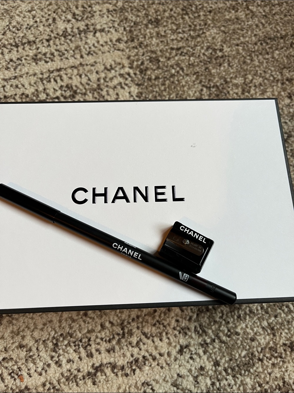 Chanel Pencil and Sharpener, brown color.
